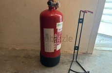 Fire! extinguisher with stand. Never used. Full. For car or home Fire extinguisher with stand. Never used. Full. For car or home Fire extinguisher with stand. Never used. Full. For car or home